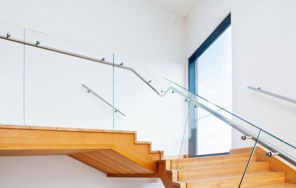 glass face mounted balustrade on internal stairs