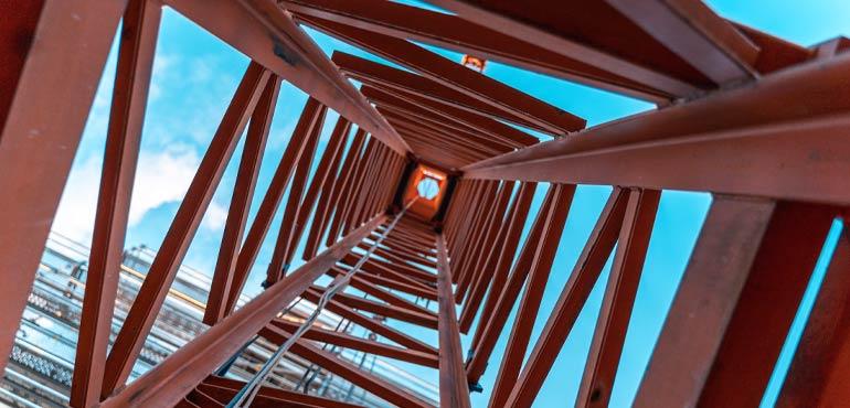 Looking up inside a red crane