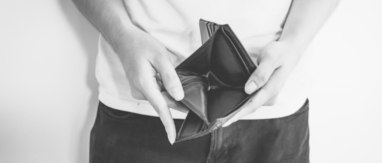 male hands holding open wallet