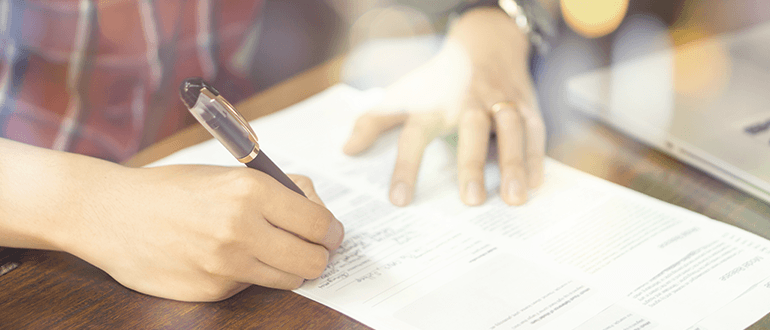man hand pen paper document