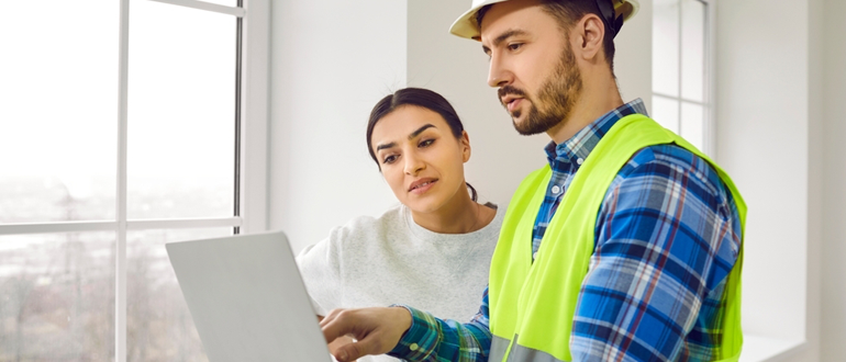 home owner builder laptop discussing inspection